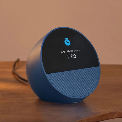 O Amazon Echo Spot é um elegante relógio inteligente com alarme, controlado por voz através da Alexa. Controla outros dispositivos. Ecrã tátil de 2,83''. WiFi de banda dupla. Design sofisticado. Bluetooth v5.0. 